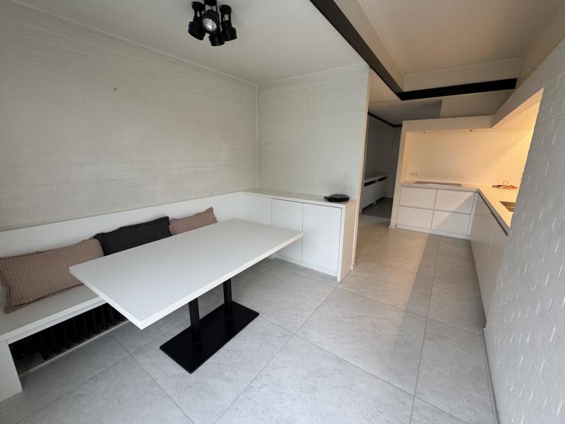 Bright modern penthouse bedroom for student rental, with shared common space, near Howest Kortrijk
