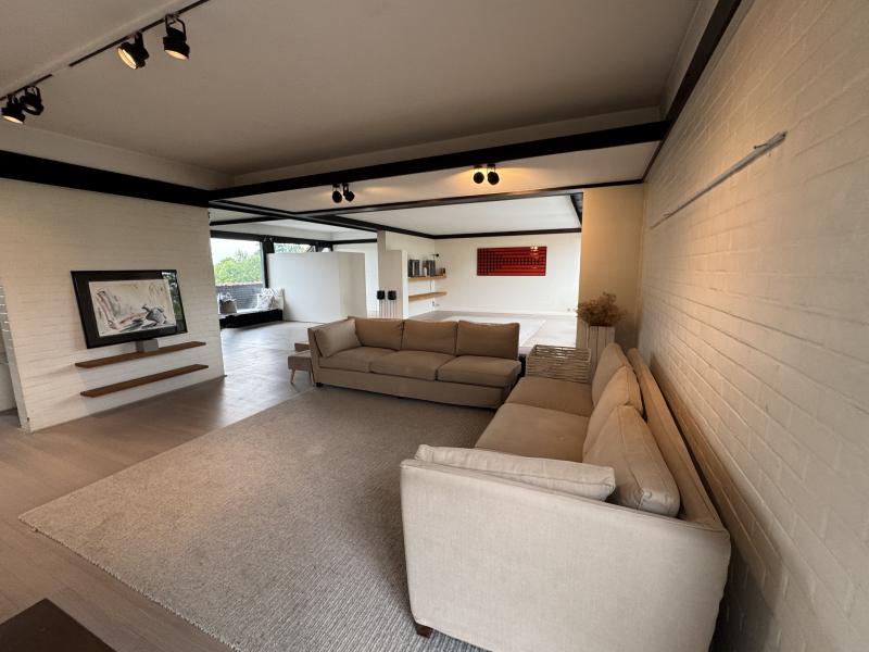 Bright modern penthouse bedroom for student rental, with shared common space, near Howest Kortrijk